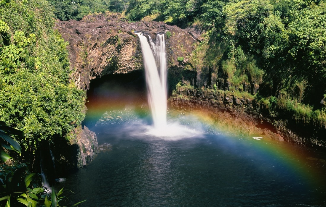 Rainbow underneath a waterfall